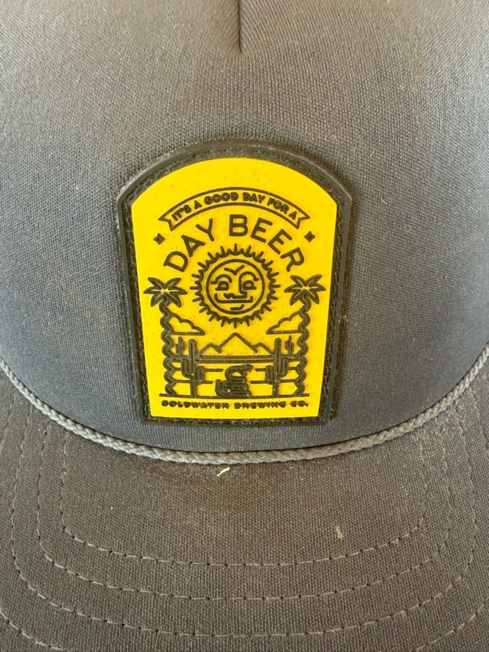 It’s a Good Day for a Day Beer Patch Trucker Hat - Black with Yellow Patch